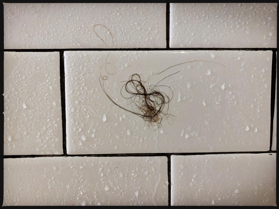 Hair on a shower wall