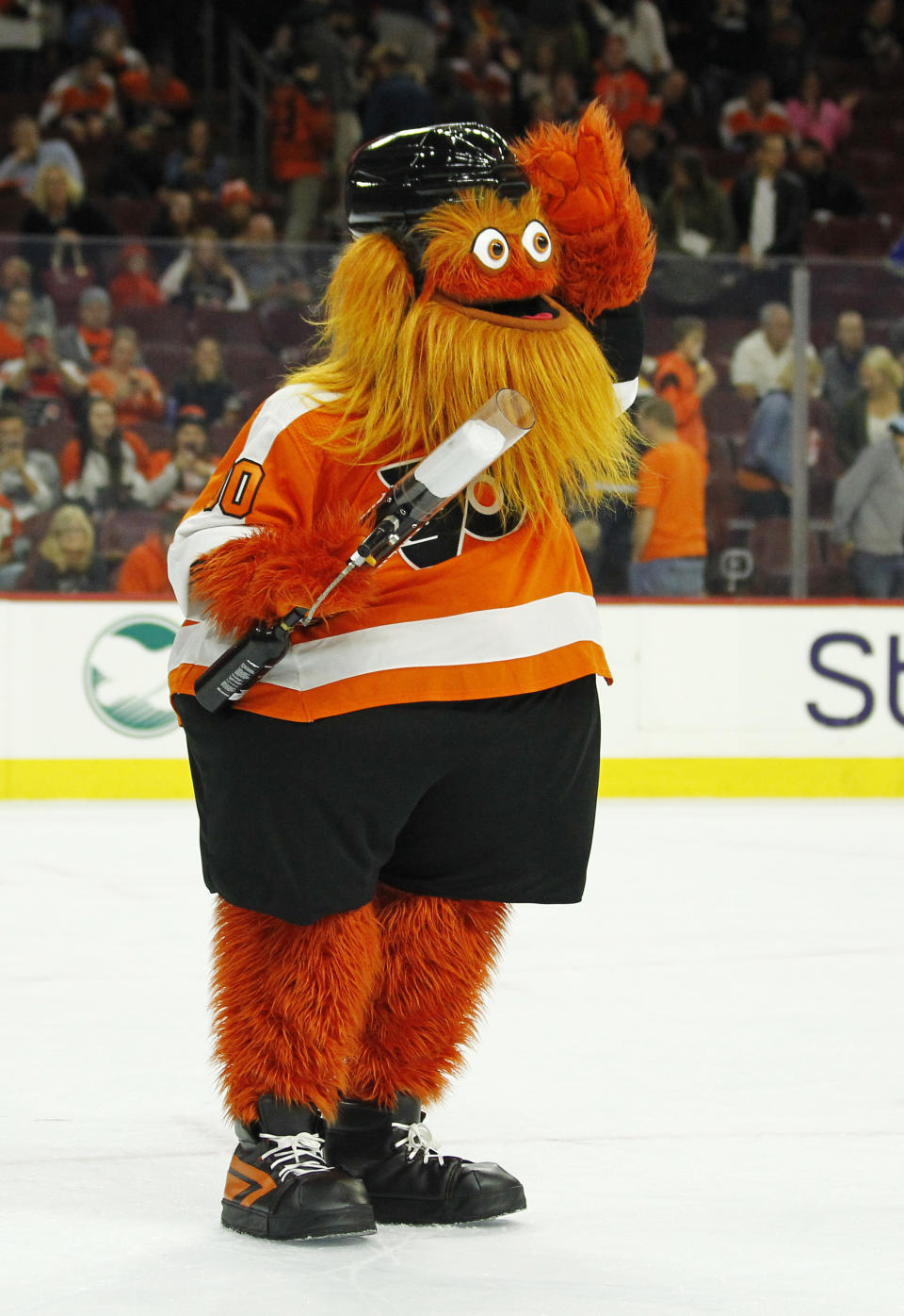 The Philadelphia Flyers mascot, Gritty, takes to the ice during the first intermission of the Flyers' preseason NHL hockey game against the Boston Bruins, Monday, Sept, 24, 2018, in Philadelphia. (AP Photo/Tom Mihalek)