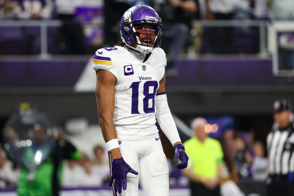 Dec 24, 2023; Minneapolis, Minnesota, USA; Minnesota Vikings wide receiver <a class="link " href="https://sports.yahoo.com/nfl/players/32692" data-i13n="sec:content-canvas;subsec:anchor_text;elm:context_link" data-ylk="slk:Justin Jefferson;sec:content-canvas;subsec:anchor_text;elm:context_link;itc:0">Justin Jefferson</a> (18) celebrates wide receiver K.J. Osborn’s (17) touchdown against the <a class="link " href="https://sports.yahoo.com/nfl/teams/detroit/" data-i13n="sec:content-canvas;subsec:anchor_text;elm:context_link" data-ylk="slk:Detroit Lions;sec:content-canvas;subsec:anchor_text;elm:context_link;itc:0">Detroit Lions</a> during the third quarter at U.S. Bank Stadium. Mandatory Credit: Matt Krohn-USA TODAY Sports