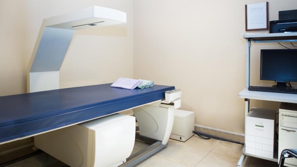 A DEXA scanner machine in a medical office