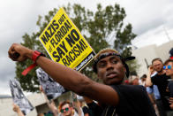 <p>Demonstrators gather outside the location where Richard Spencer, an avowed white nationalist and spokesperson for the so-called alt-right movement, is delivering a speech on the campus of the University of Florida in Gainesville, Fla., Oct. 19, 2017. (Photo: Shannon Stapleton/Reuters) </p>