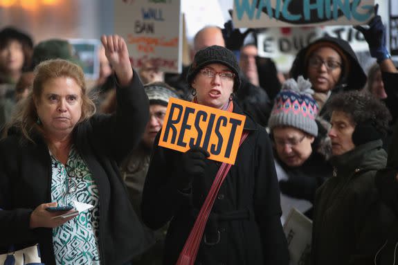 Chicago protestors show their disdain for Donald Trump's cabinet picks.