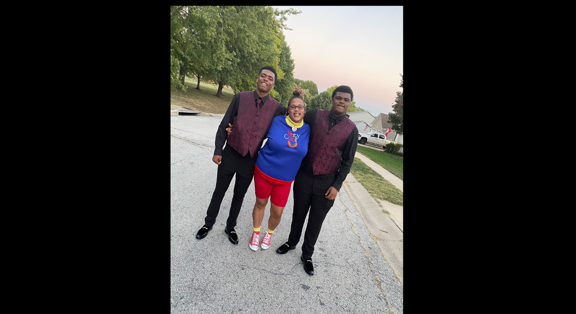 DeVohn Dudley-Reese poses for a photo with his mother, DeShawn Reese, and his brother ahead of his high school homecoming dance in Fall 2022. The 16-year-old was killed several weeks later in a shooting in Kansas City.
