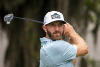 FILE - In this April 15, 2021, file photo, Dustin Johnson watches his drive off the eighth tee during the first round of the RBC Heritage golf tournament in Hilton Head Island, S.C. (AP Photo/Stephen B. Morton, File)