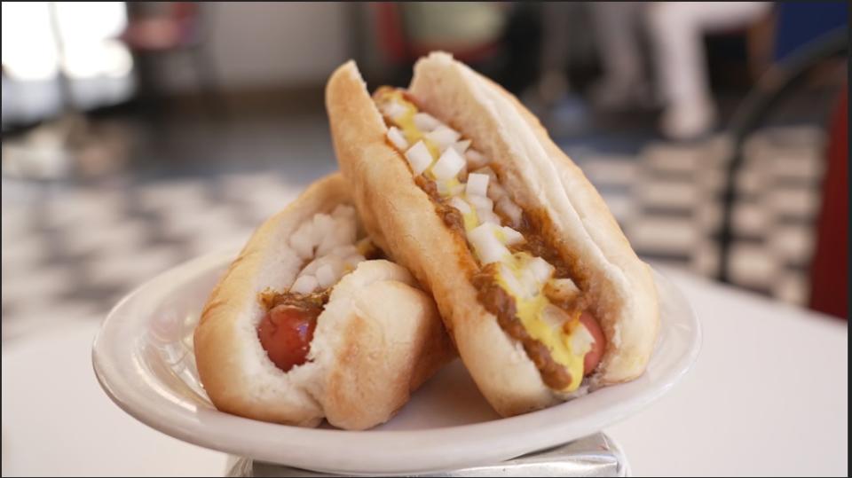 A coney hot dog is a Detroit staple and it's smothered in a savory chili sauce, tangy mustard and chopped onions. (TODAY All Day)