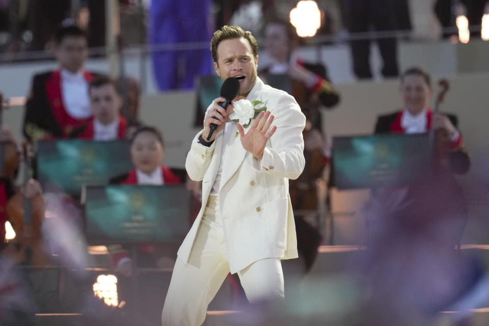 Olly Murs performs during a concert at Windsor Castle in Windsor, England, Sunday, May 7, 2023, celebrating the coronation of King Charles III. It's one of several events over a three-day weekend of celebrations. (AP Photo/Kin Cheung, Pool)