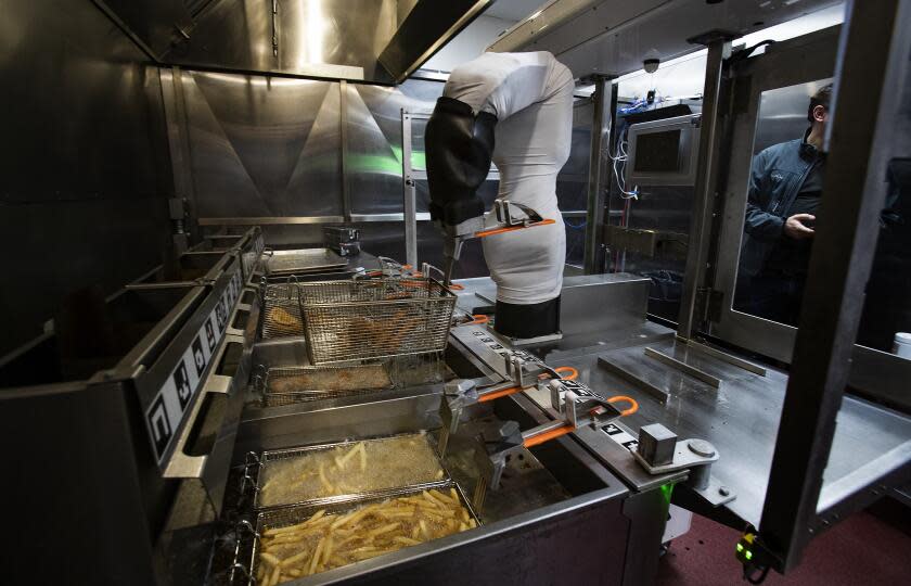 PASADENA CA - JANUARY 28, 2020: Flippy the robot demonstrates its ability to man a fry station at Miso Robotics on January 28, 2020 in Pasadena, California.(Gina Ferazzi/Los AngelesTimes)