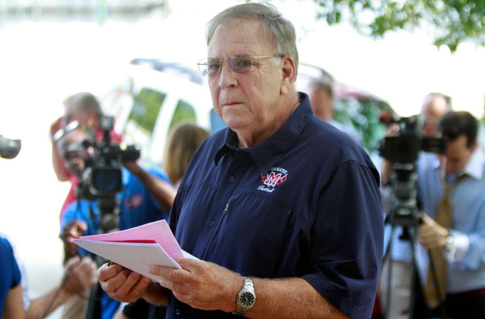 Former, Manatee High School footbal head coach Joe Kinnan holds a news conference on the steps of Bradenton's City Centre. (August 13, 2014)