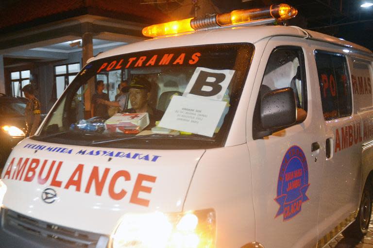 An ambulance transports the body of executed Dutchman Ang Kiem Soei from Nusakambangan prison in Cilacap, on January 18, 2014, as Indonesia carried out its first executions under new President Joko Widodo