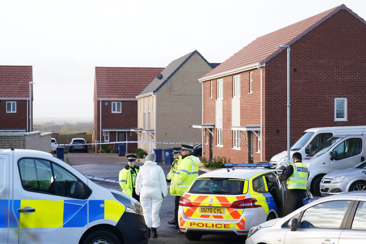 Police at the scene in Meridian Close, Bluntisham, Cambridgeshire, where police found the body of a 32-year-old man with a gunshot wound on Wednesday evening (PA)