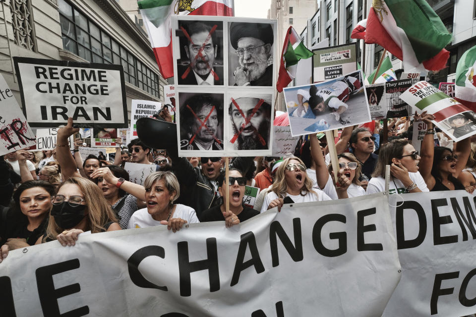 Women shout during a protest against the Iranian regime, in Los Angeles, on Saturday, Oct. 22, 2022, following the death of Mahsa Amini in the custody of the Islamic republic's notorious "morality police." Chanting crowds have rallied in Berlin, Washington DC and Los Angeles in solidarity with protesters facing a violent government crackdown in Iran. (AP Photo/Richard Vogel)