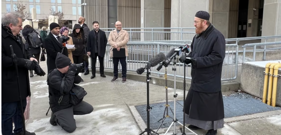 Imam Abd Alfatah Twakkal, chair of the London Council of Imams, speaks outside the London court ahead of the sentencing hearing that began Thursday. (Greg Bruce/CBC)