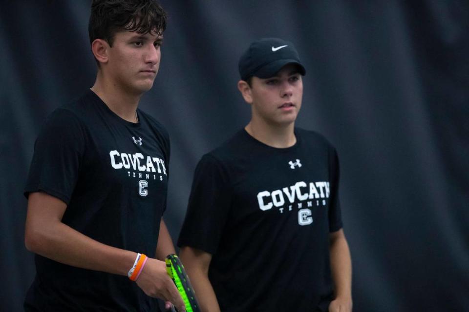 Covington Catholic’s Kalei Christensen, left, and Alex Yeager fought back from a dropped first set to win the boys’ doubles championship.