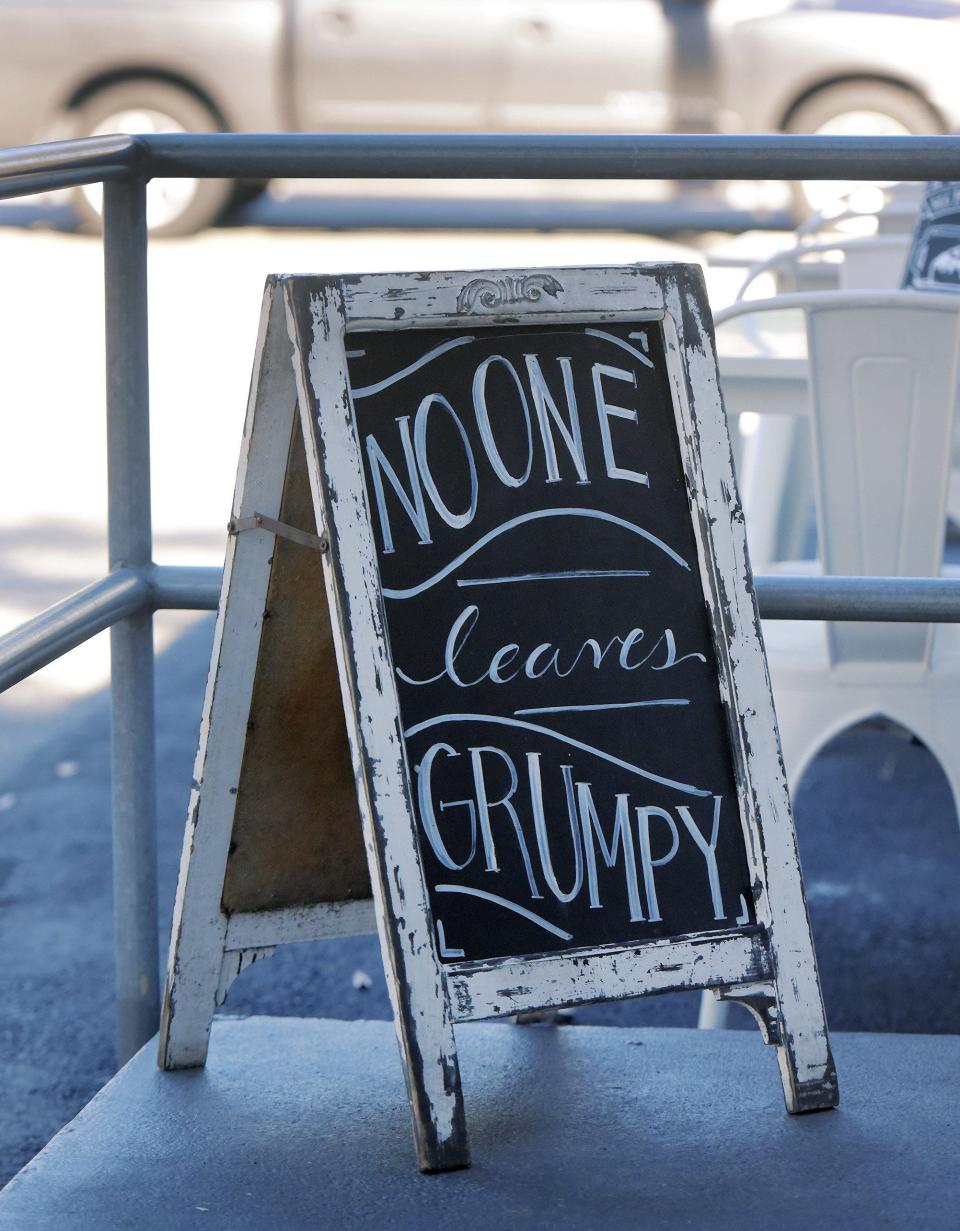 The signboard outside the front doors of Grumpy's Restaurant in Orange Park promises good food and hospitality  — the original promise of the 22-year-old restaurant that nearly closed permanently but was transformed into a successful business by current owners Daniel and Morgan DeLeon.