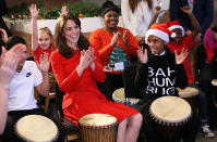 Kate trying out some drumming 'music therapy' at the Anna Freud Centre Family School Christmas Party in 2015. (Chris Jackson - WPA Pool/Getty Images)