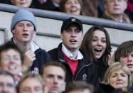 <p>Kate, a known sports fan, along with Prince William and Harry, cheered on the English rugby team at a championship match against Italy.</p>