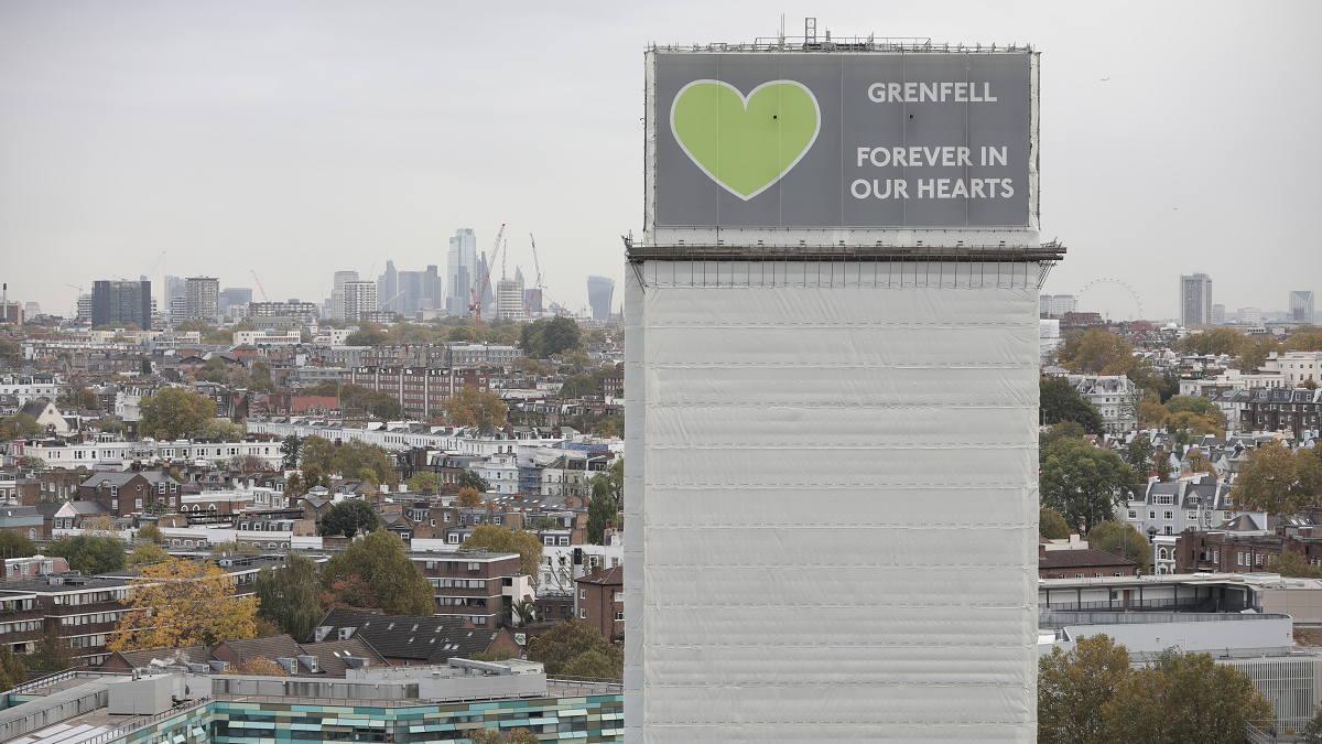 A general view of what remains of Grenfell Tower covered with hoardings following a severe fire in June 2017 on October 29, 2019