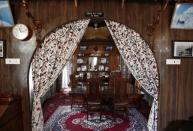 Interiors of an empty houseboat are pictured in Srinagar