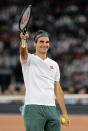 Roger Federer waves at the crowd during the exhibition tennis match against Rafael Nadal held at the Cape Town Stadium in Cape Town, South Africa, Friday Feb. 7, 2020. (AP Photo/Halden Krog)