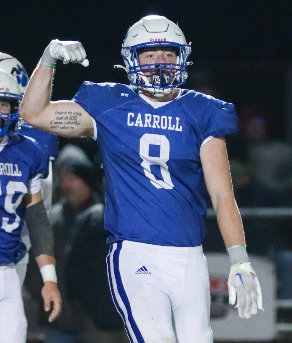 Keegan Ellis celebrates on Friday, Nov. 10, 2023, during the IHSAA Class A regional championship game at Carroll High School in Flora, Ind. Adams Central defeated Carroll, 29-0.
