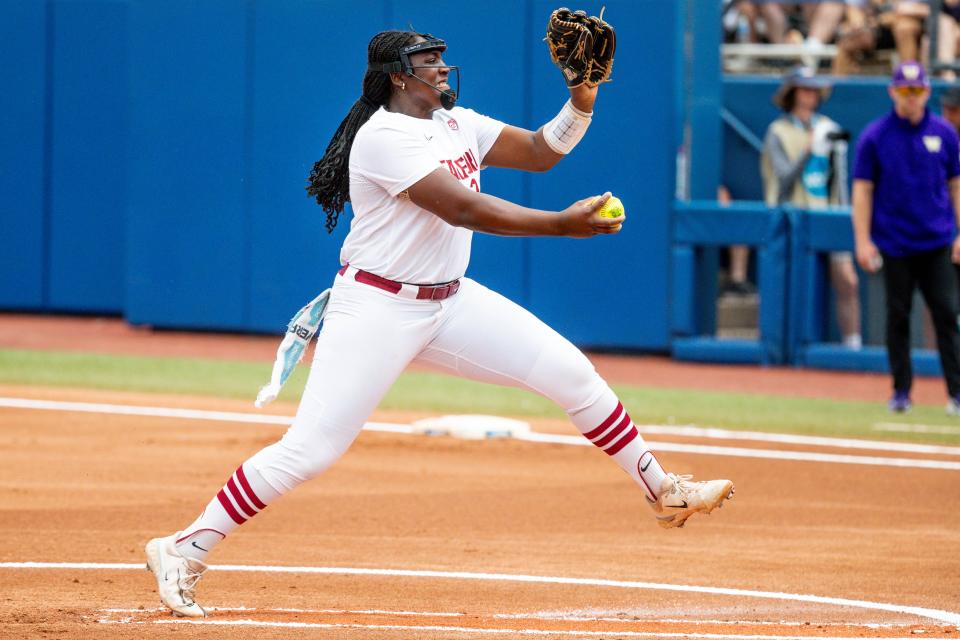 Stanford starting pitcher/relief pitcher NiJaree Canady (24)  pitches during a softball game between Stanford and Washington at the Women's College World Series at USA Softball Hall of Fame Stadium in in Oklahoma City on Sunday, June 4, 2023.