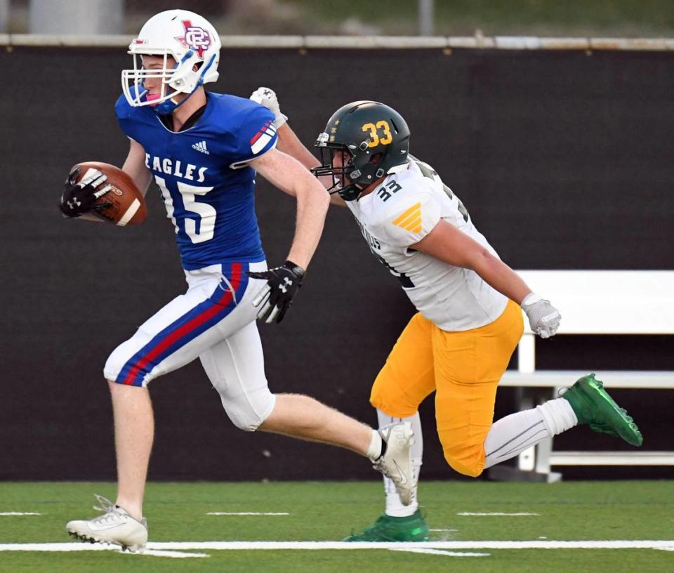 Carter-Riverside’s Brian Terrell, left takes a catch in run past Western Hills’s Besmir Salihu for a touchdown to take a 10-7 lead in the first quarter of Thursday’s September 22, 2022 District 6-4A Division 1 football game at Scarborough Handley Field in Fort Worth, Texas. Special/Bob Haynes