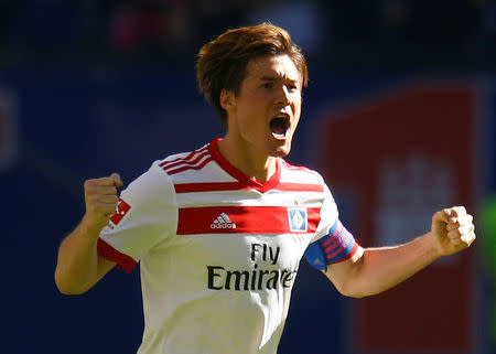 Soccer Football - Bundesliga - Hamburger SV vs SC Freiburg - Volksparkstadion, Hamburg, Germany - April 21, 2018 Hamburg's Gotoku Sakai celebrates their first goal REUTERS/Morris Mac Matzen