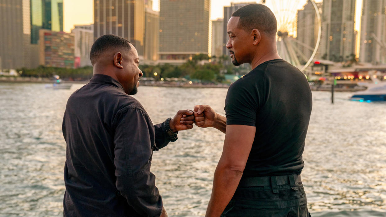  Marcus (Martin Lawrence) and Mike (Will Smith) fist bump in Bad Boys: Ride Or Die . 