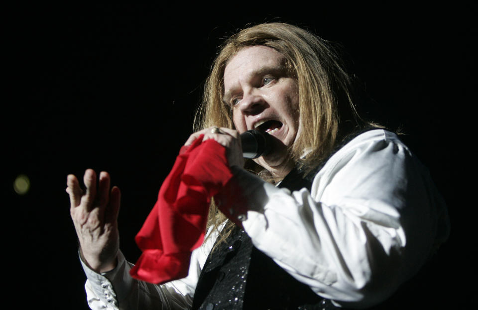 FILE - Rock star Meat Loaf appears on stage during the first concert of his tour through Germany in Hamburg, northern Germany, Tuesday, June 12, 2007. Meat Loaf, the rock superstar loved by millions for his “Bat Out of Hell” album and for such theatrical, dark-hearted anthems as “Paradise by the Dashboard Light” and “Two Out of Three Ain’t Bad,” has died at age 74. A family statement on his official Facebook page says the singer born Marvin Lee Aday died Thursday night, Jan. 20, 2022. “Bat Out of a Hell,” his mega-selling collaboration with songwriter Jim Steinman, came out in 1977 and became one of the bestselling records in history. (AP Photo/Kai-Uwe Knoth, File)