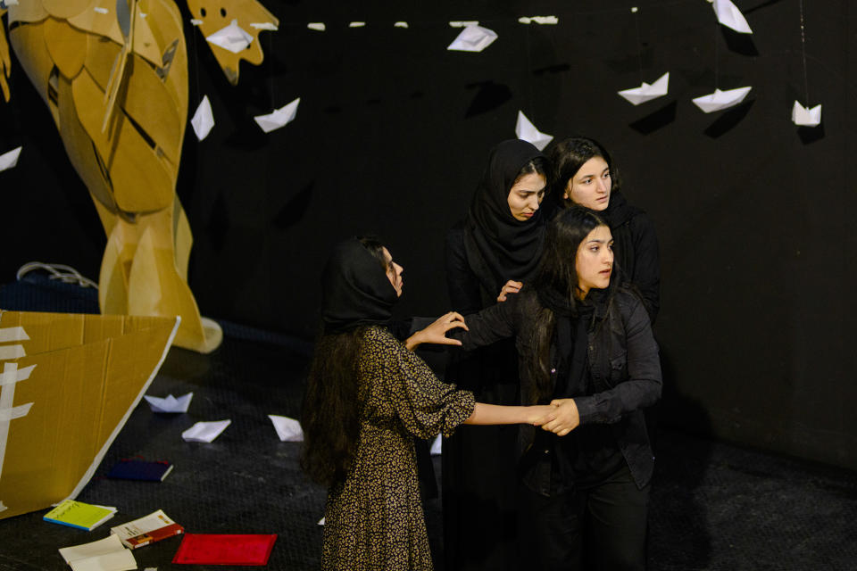 Members of the Théâtre de Mahoor perform during "La renaissance des filles afghanes" (The rebirth of Afghan girls) in Crotone, southern Italy, Saturday, Feb. 24, 2024. The show, curated by the Afghan community in Italy, is part of the celebrations to help mark the first anniversary of the shipwreck of a migrant boat that capsized in the early morning of Sunday, Feb. 26, 2023, at a short distance from the shore in Steccato di Cutro, near Crotone killing at least 94 people. Survivors and family members of the victims are converging in the area for a commemoration on Monday, Feb. 26, 2024, on the first anniversary of the disaster. (AP Photo/Valeria Ferraro)