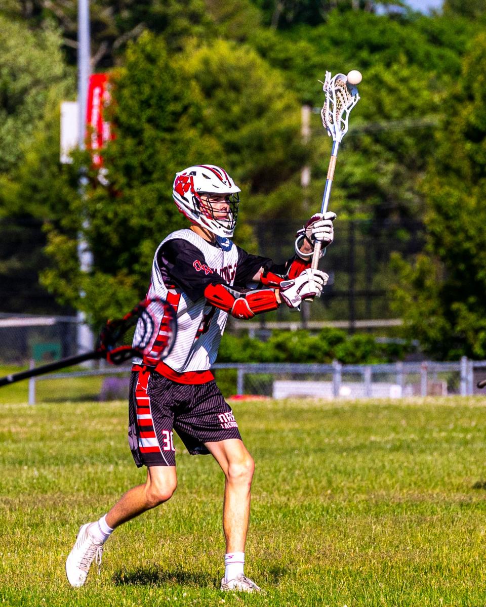 Old Rochester's Sawyer Fox looks to change the point of view of the attack.