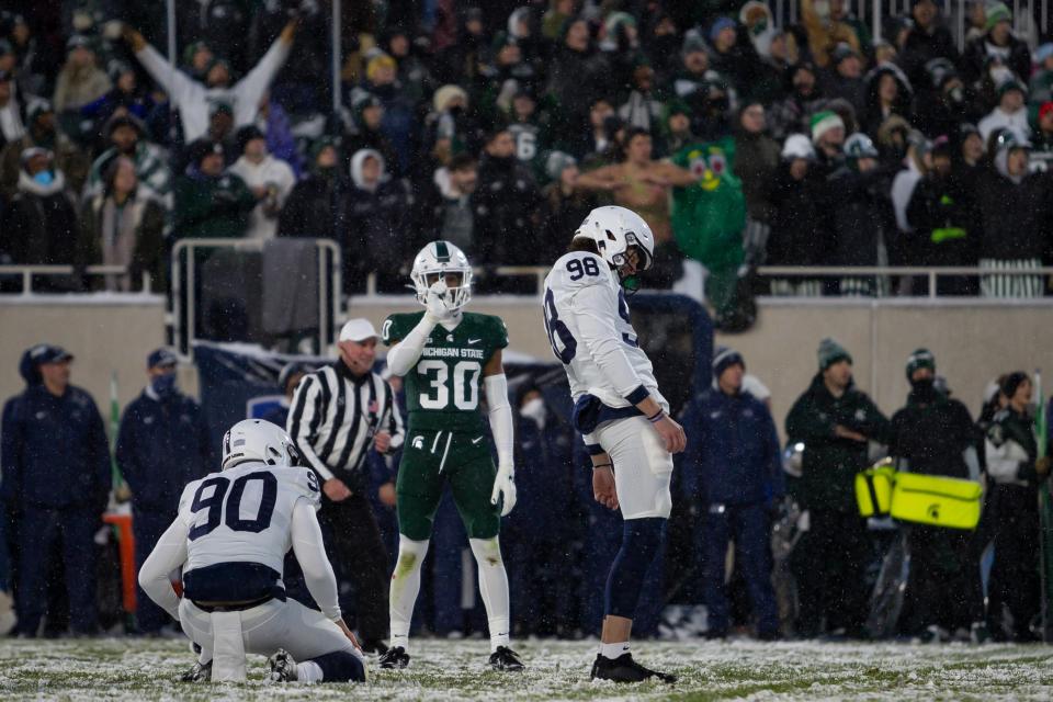 Nov 27, 2021; East Lansing, Michigan, USA; Penn State Nittany Lions place kicker Jordan Stout (98) reacts after missing a field goal during the second quarter against the Michigan State Spartans at Spartan Stadium. Mandatory Credit: Raj Mehta-USA TODAY Sports