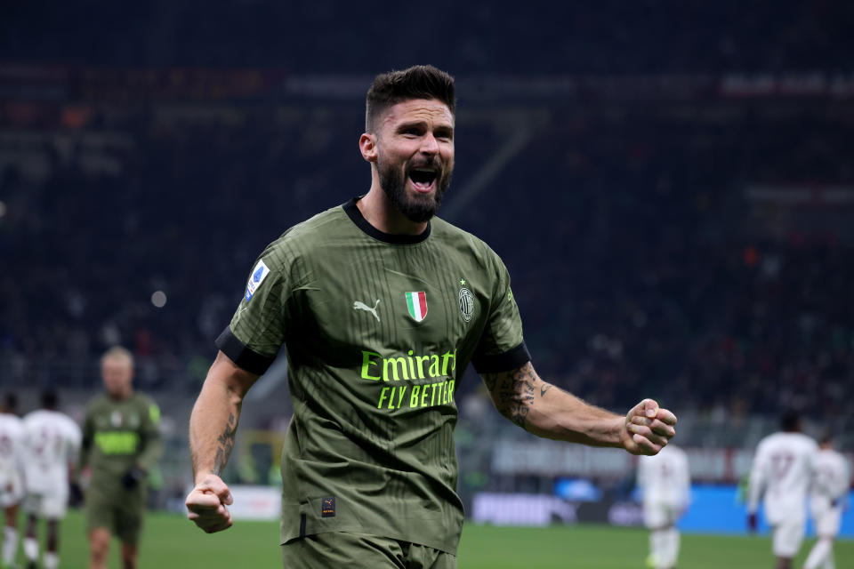 MILAN, ITALY - FEBRUARY 10: Olivier Giroud of AC Milan celebrates after scoring their first goal during the Serie A match between AC MIlan and Torino FC at Stadio Giuseppe Meazza on February 10, 2023 in Milan, Italy. (Photo by Claudia Greco/Getty Images)