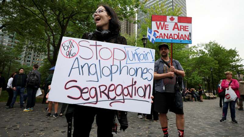 Photo: English-speaking opponents of Quebec’s French language Bill 96 protest in downtown Montreal, Quebec, on May 26, 2022; Christinne Muschi/Reuters