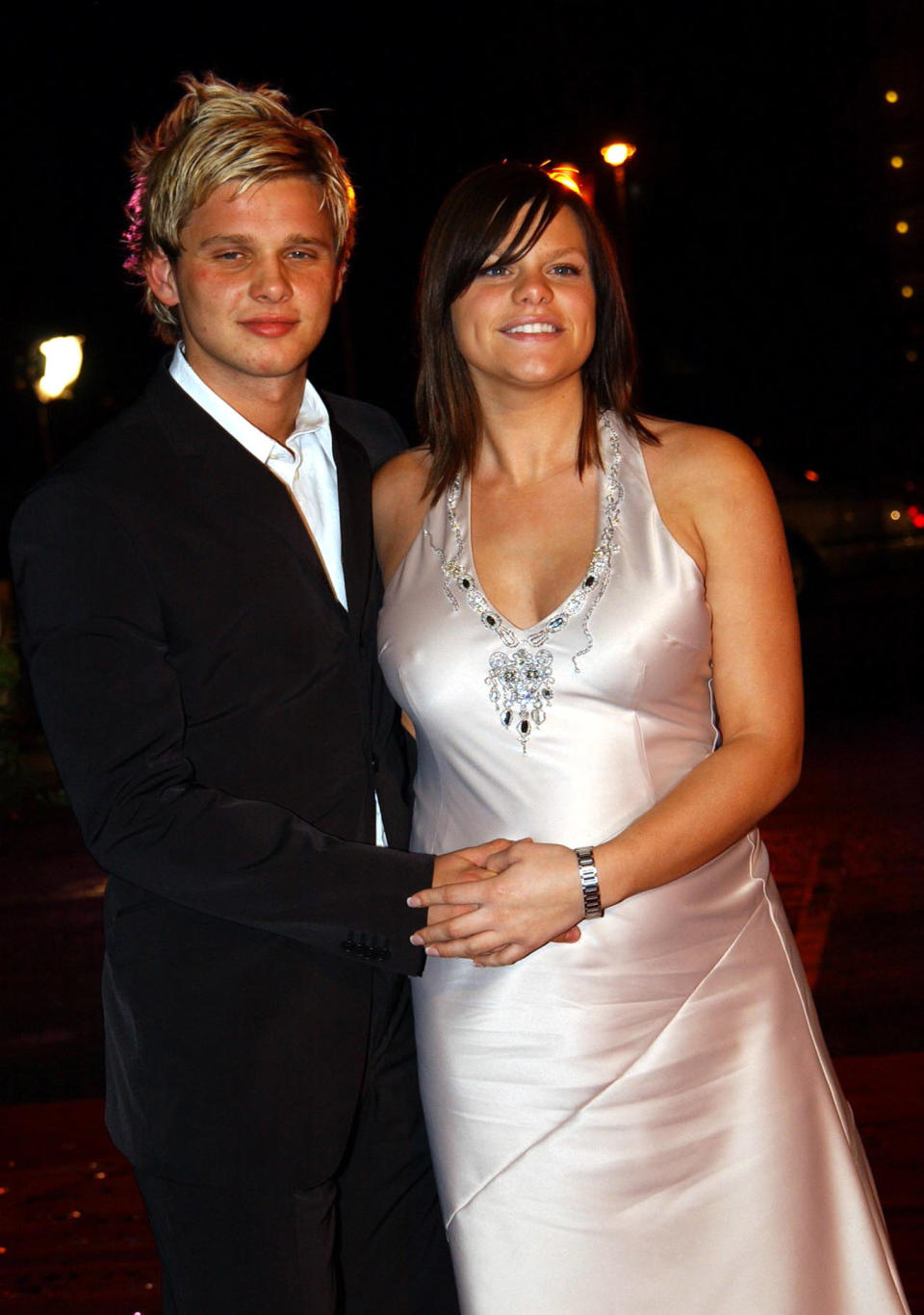 Big Brother 3 contestant Jade Goody & Jeff Brazier arrive for the recording of 'TV Moments 2002' at BBC TV Centre in West London.   (Photo by Andy Butterton - PA Images/PA Images via Getty Images)