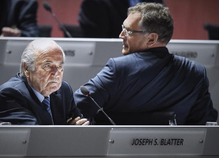 A photo taken on May 29, 2015 shows then-FIFA President Sepp Blatter (L) and FIFA secretary general Jerome Valcke attending the 65th FIFA Congress in Zurich
