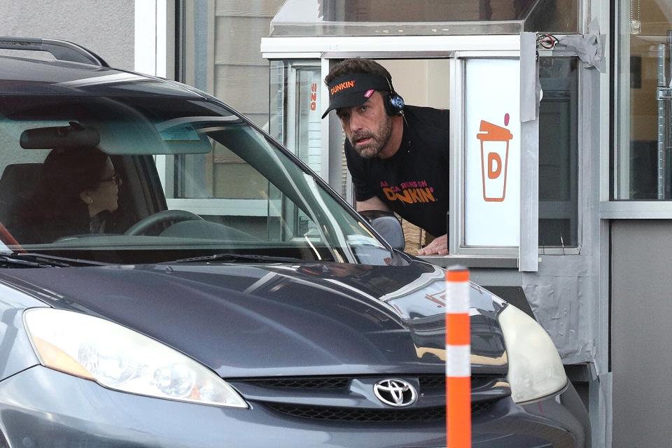 *PREMIUM-EXCLUSIVE* Ben Affleck surprising customers when working the drive-through at Dunkin Donuts