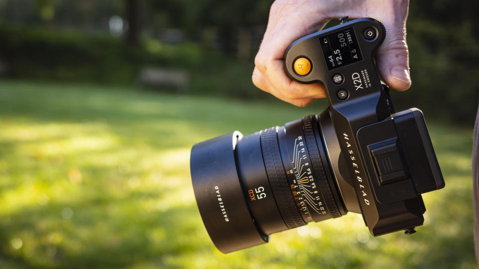 The Hasselblad X2D camera in hand