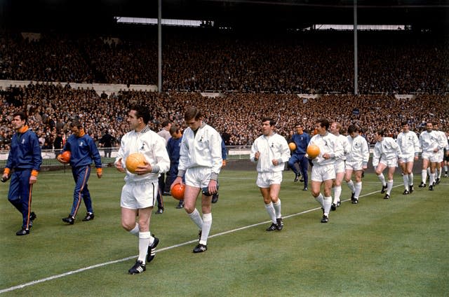 Terry Venables follows Tottenham captain Dave Mackay and goalkeeper Pat Jennings out at Wembley