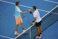 Tennis - Australian Open - Melbourne Park, Melbourne, Australia - 21/1/17 Spain's Rafael Nadal shakes hands after winning his Men's singles third round match against Germany's Alexander Zverev. REUTERS/Jason Reed