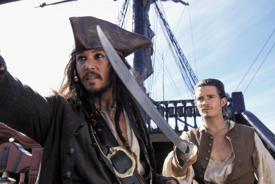 Johnny Depp and Orlando Bloom in Pirates of the Caribbean: Curse of the Black Pearl