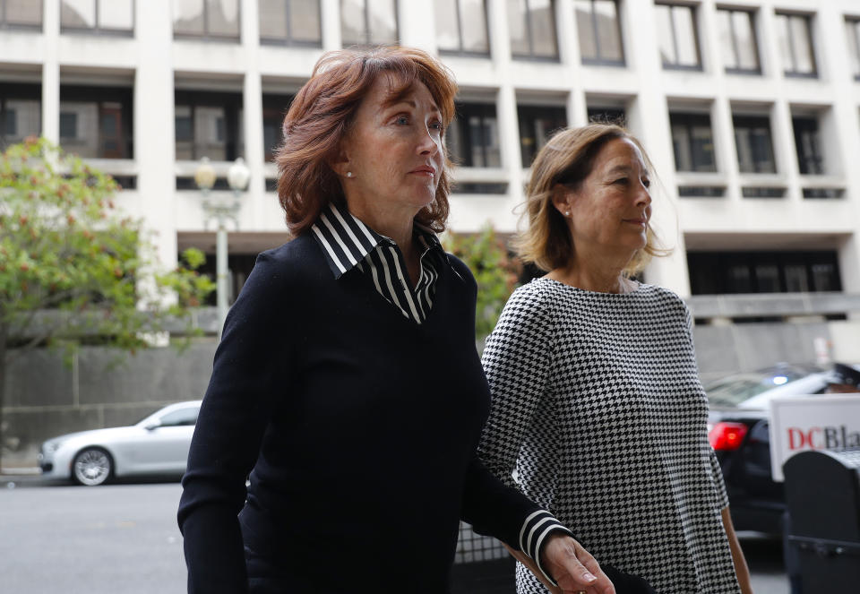 Paul Manafort's wife Kathleen Manafort, left, arrives at federal court in Washington, Friday, Sept. 14, 2018. Former Trump campaign chairman Paul Manafort is expected to plead guilty to federal charges as part of a deal with the special counsel's office. (AP Photo/Pablo Martinez Monsivais)