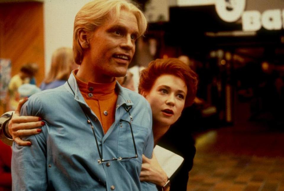 Actors John Malkovich and Ann Magnuson in a scene from “Making Mr. Right” filmed at The Mall at 163rd Street near North Miami Beach. Director Susan Seidelman’s 1987 Orion film, “Making Mr. Right,” filmed scenes at the mall and around North Miami and Miami Beach in 1986. A Baron’s menswear store that was at the 163rd Street mall is seen on the right.