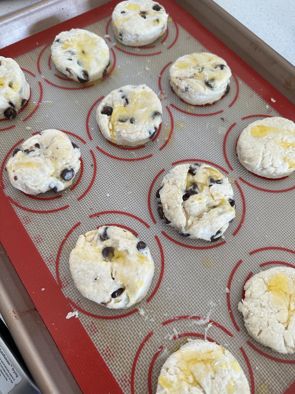 chocolate chip biscuits on a sheet pan ready to bake