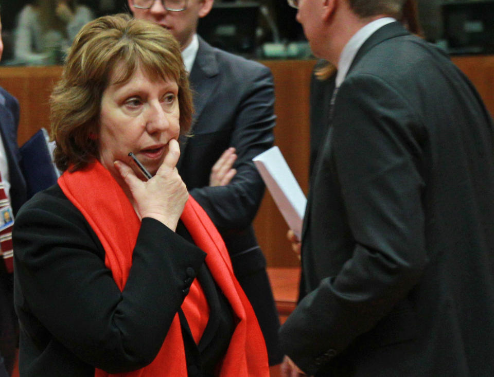 EU foreign policy chief Catherine Ashton reflects, prior to an extraordinary foreign ministers meeting on Ukraine, at the European Council building in Brussels, Thursday, Feb. 20, 2014. The 28-nation European Union holds an emergency meeting on Ukraine, to consider sanctions against those behind the violence. (AP Photo/Yves Logghe)