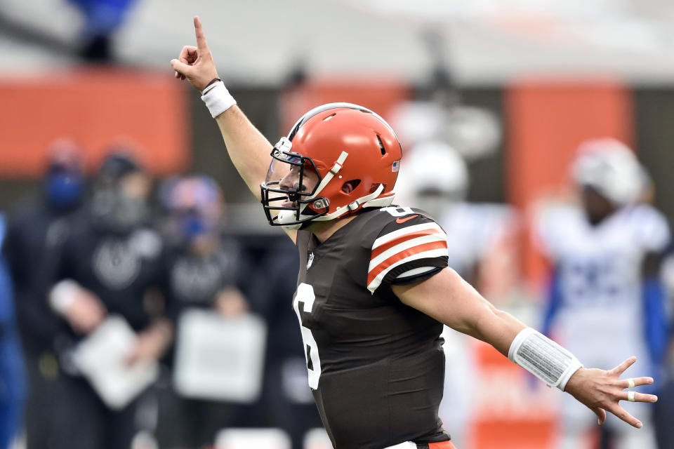 Cleveland Browns quarterback Baker Mayfield celebrates a 15-yard touchdown pass to wide receiver Rashard Higgins during the first half of an NFL football game against the Indianapolis Colts, Sunday, Oct. 11, 2020, in Cleveland. (AP Photo/David Richard)