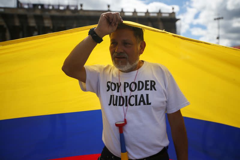 Demonstrators take part in a protest as a national strike continues in Bogota