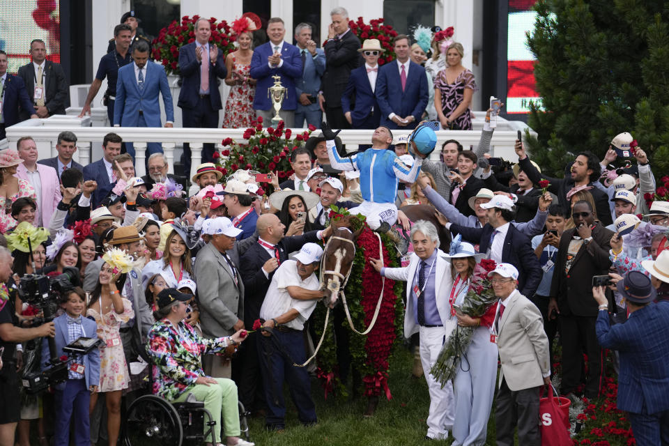 Javier Castellano, atop Mage, reacts in the winner's circle after winning the 149th running of the Kentucky Derby horse race at Churchill Downs Saturday, May 6, 2023, in Louisville, Ky. (AP Photo/Jeff Roberson)