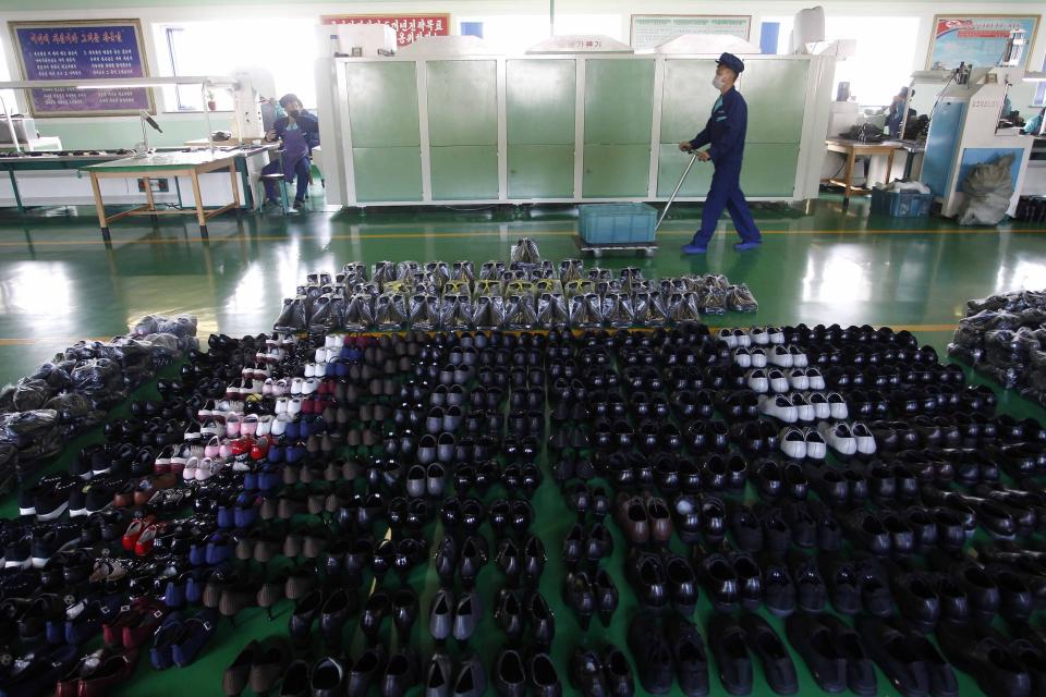 Finished shoes are prepared for distribution at the Wonsan Leather Shoes Factory, where they manufacture handmade leather shoes in Wonsan, Kangwon Province, North Korea, on Oct. 28, 2020. North Korea is staging an “80-day battle,” a propaganda-heavy productivity campaign meant to bolster its internal unity and report greater production in various industry sectors ahead of a ruling party congress in January. (AP Photo/Jon Chol Jin)