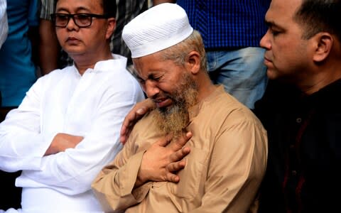 Relatives of Nusrat Jahan Rafi weeping as her body is handed over - Credit: Mamunur Rashid/NurPhoto via Getty Images